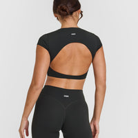 SoftMotion™ Short Sleeve Crop Top with White Logo | Soft Black