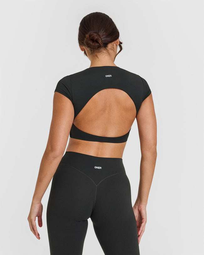 SoftMotion™ Short Sleeve Crop Top with White Logo | Soft Black