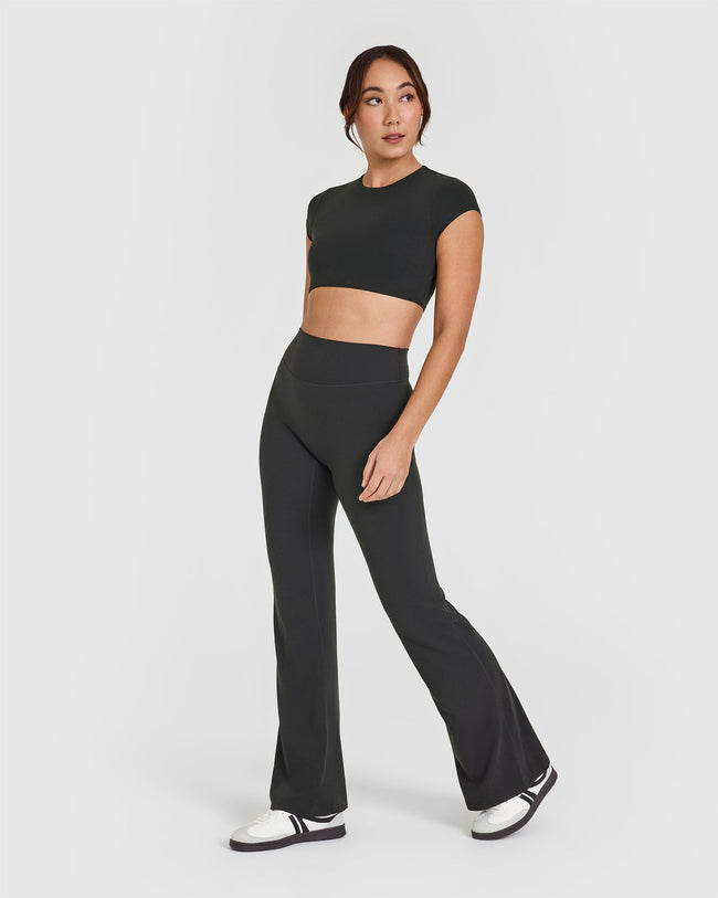 SoftMotion™ Short Sleeve Crop Top with White Logo | Soft Black