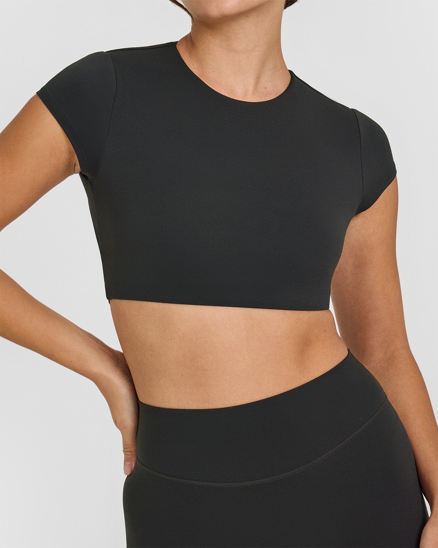 SoftMotion™ Short Sleeve Crop Top with White Logo | Soft Black