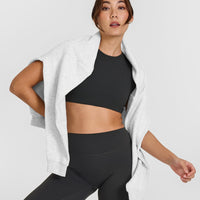 SoftMotion™ Short Sleeve Crop Top with White Logo | Soft Black