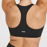 SoftMotion™ Bralette with White Logo | Soft Black