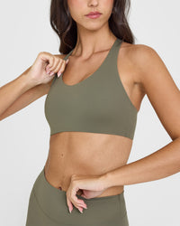 SoftMotion™ Sports Bra with White Logo | Alpine Green