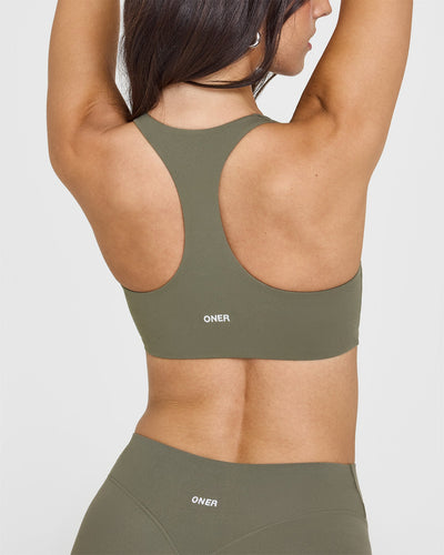SoftMotion™ Sports Bra with White Logo | Alpine Green