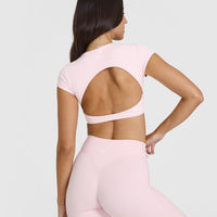 SoftMotion™ Short Sleeve Crop Top with White Logo | Ballet Pink