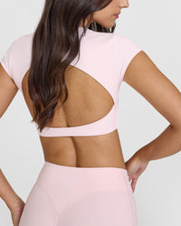 SoftMotion™ Short Sleeve Crop Top with White Logo | Ballet Pink