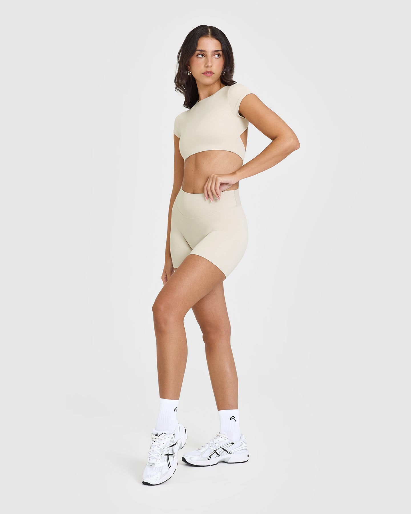 SoftMotion™ Short Sleeve Crop Top with White Logo | Sand