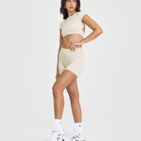 SoftMotion™ Short Sleeve Crop Top with White Logo | Sand