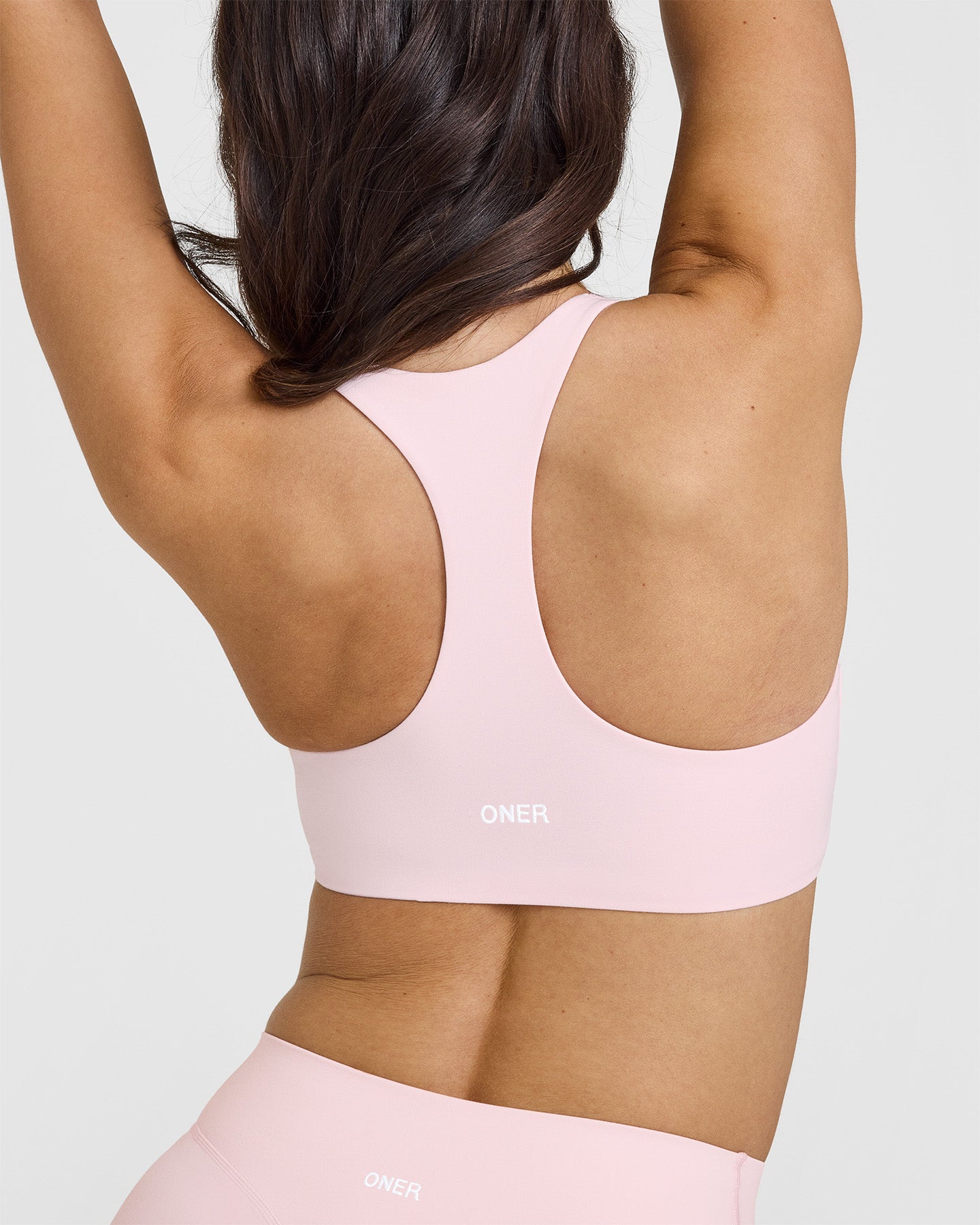 SoftMotion™ Sports Bra with White Logo | Ballet Pink