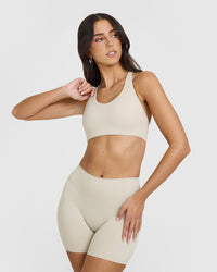 SoftMotion™ Sports Bra with White Logo | Sand