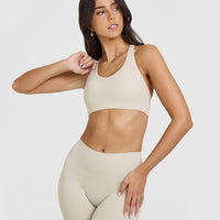 SoftMotion™ Sports Bra with White Logo | Sand