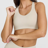 SoftMotion™ Sports Bra with White Logo | Sand