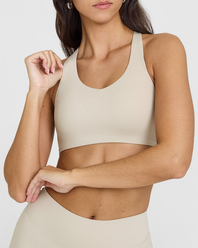 SoftMotion™ Sports Bra with White Logo | Sand