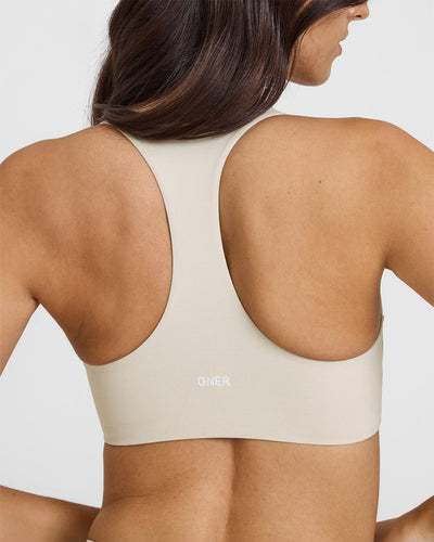 SoftMotion™ Sports Bra with White Logo | Sand