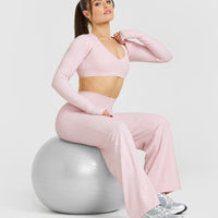 SoftMotion™ Long Sleeve Shrug with White Logo | Ballet Pink