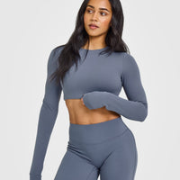 SoftMotion™ Long Sleeve Crop Top with White Logo | Granite Blue