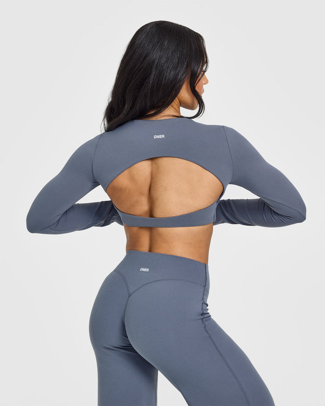 SoftMotion™ Long Sleeve Crop Top with White Logo | Granite Blue