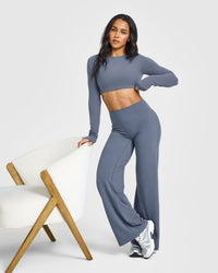 SoftMotion™ Long Sleeve Crop Top with White Logo | Granite Blue