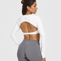 SoftMotion™ Long Sleeve Crop Top with White Logo | White