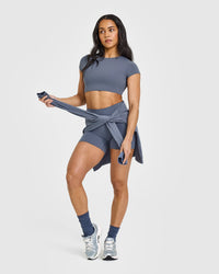 SoftMotion™ Short Sleeve Crop Top with White Logo | Granite Blue