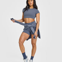 SoftMotion™ Short Sleeve Crop Top with White Logo | Granite Blue