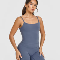 SoftMotion™ Strappy Mid Vest with Built in Bra Shelf with White Logo | Granite Blue