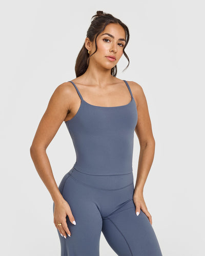 SoftMotion™ Strappy Mid Vest with Built in Bra Shelf with White Logo | Granite Blue