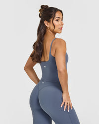 SoftMotion™ Strappy Mid Vest with Built in Bra Shelf with White Logo | Granite Blue