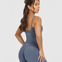 SoftMotion™ Strappy Mid Vest with Built in Bra Shelf with White Logo | Granite Blue