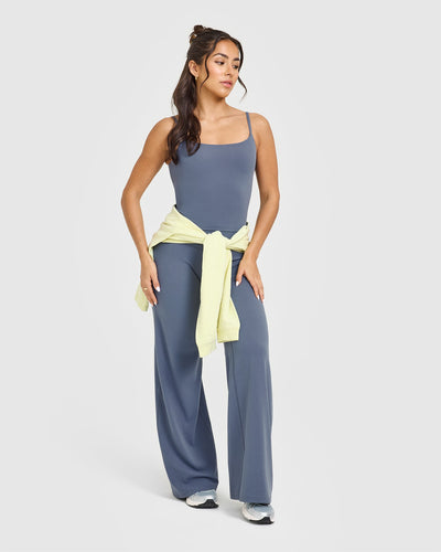 SoftMotion™ Strappy Mid Vest with Built in Bra Shelf with White Logo | Granite Blue