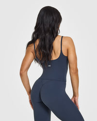 SoftMotion™ Strappy Mid Vest with Built in Bra Shelf with White Logo | True Blue