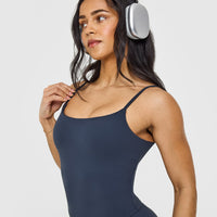 SoftMotion™ Strappy Mid Vest with Built in Bra Shelf with White Logo | True Blue