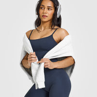 SoftMotion™ Strappy Mid Vest with Built in Bra Shelf with White Logo | True Blue