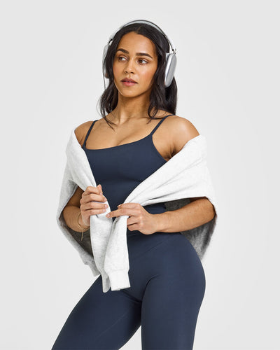 SoftMotion™ Strappy Mid Vest with Built in Bra Shelf with White Logo | True Blue