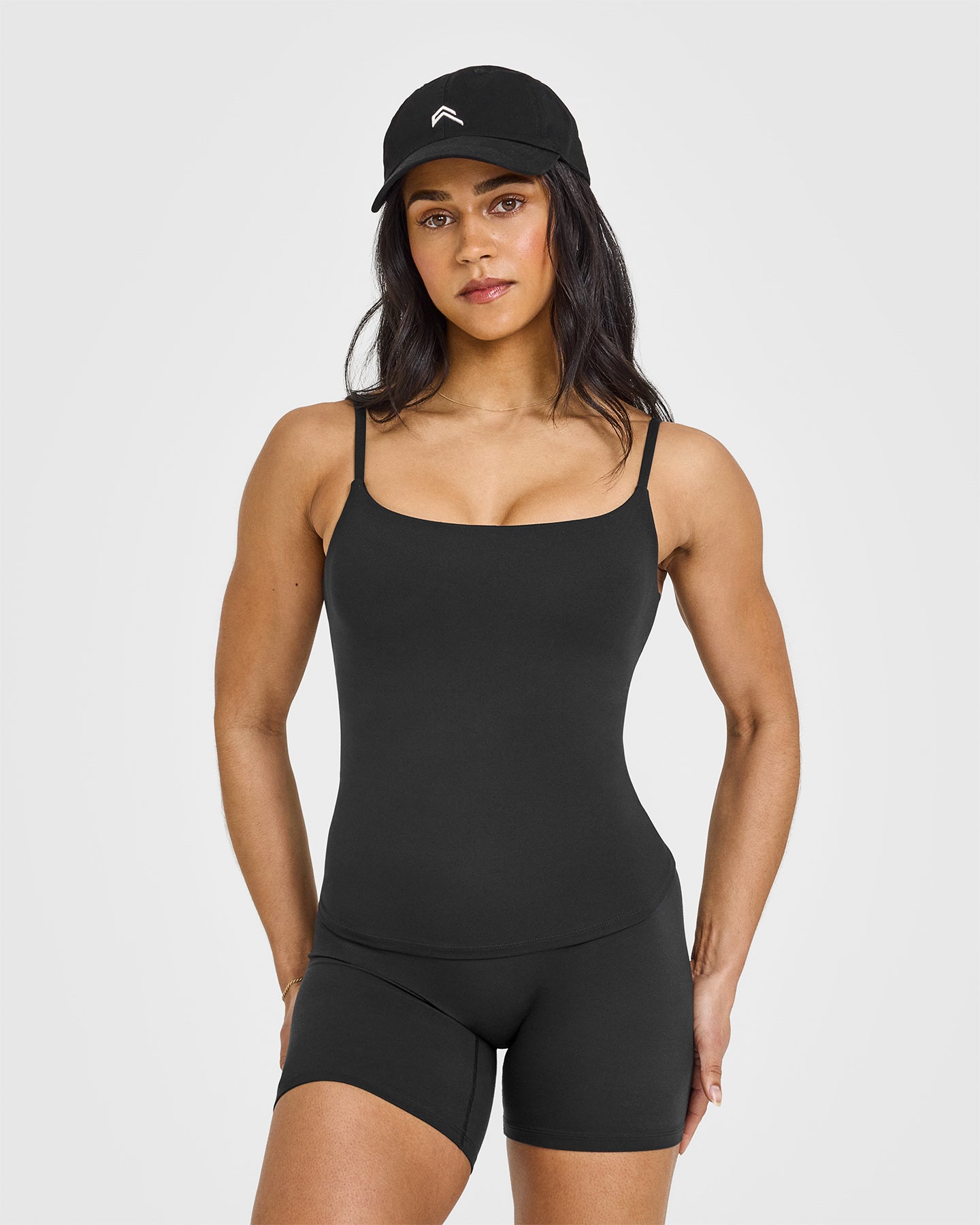 SoftMotion™ Strappy Vest with Built in Bra Shelf with White Logo | Soft Black