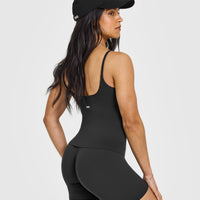 SoftMotion™ Strappy Vest with Built in Bra Shelf with White Logo | Soft Black