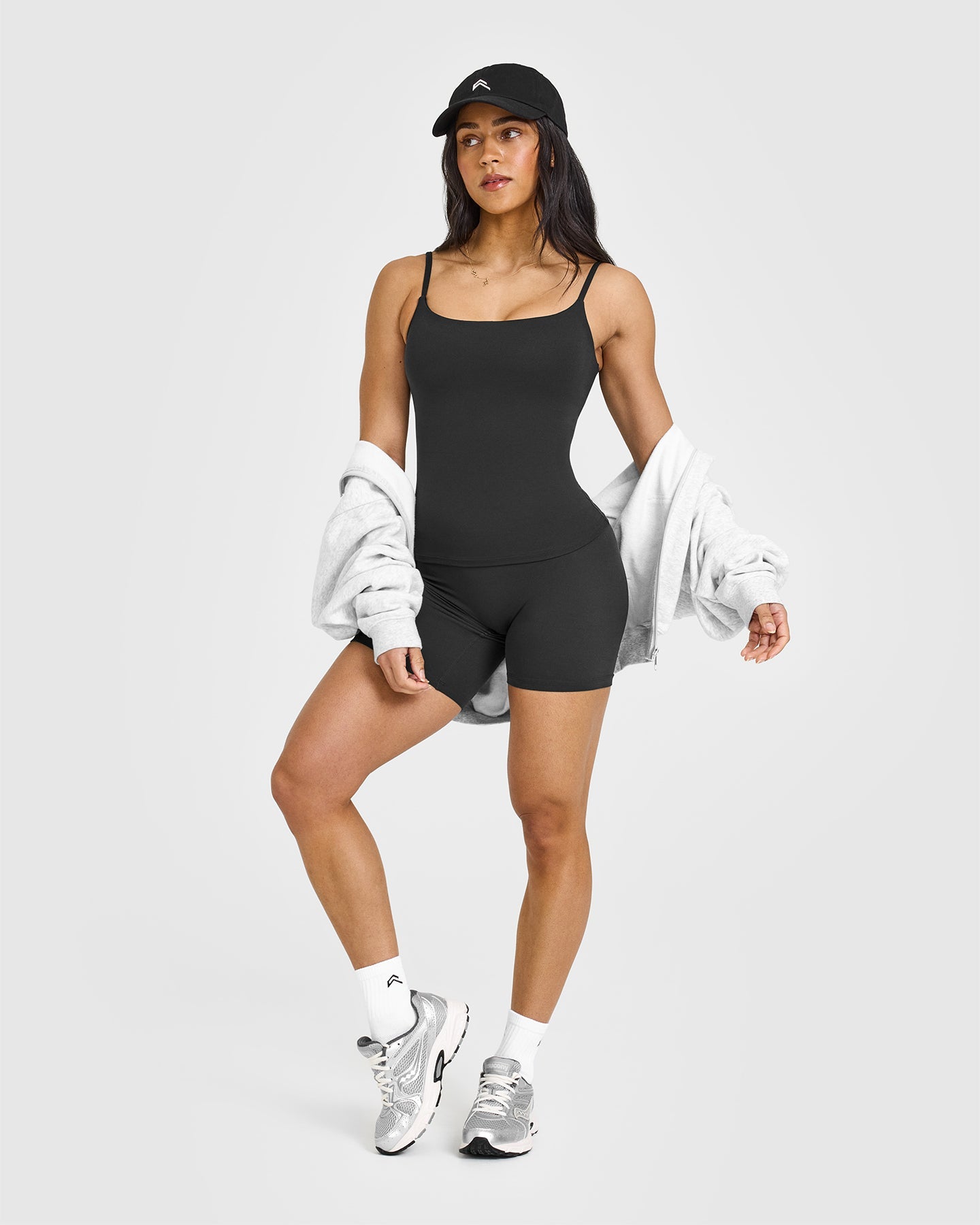SoftMotion™ Strappy Vest with Built in Bra Shelf with White Logo | Soft Black
