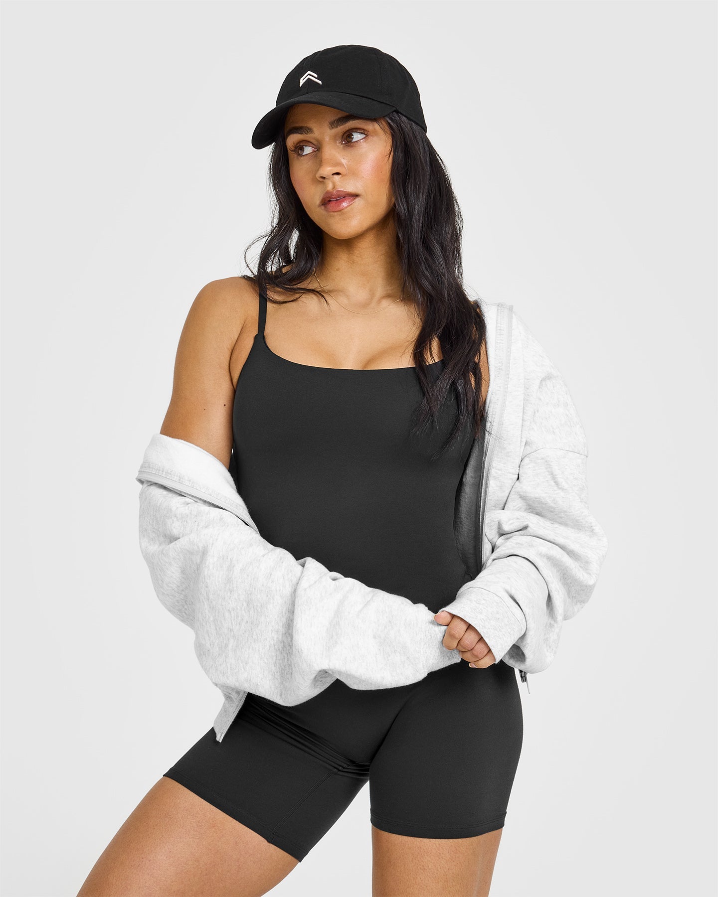 SoftMotion™ Strappy Vest with Built in Bra Shelf with White Logo | Soft Black