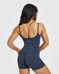 SoftMotion™ Strappy Vest with Built in Bra Shelf with White Logo | True Blue