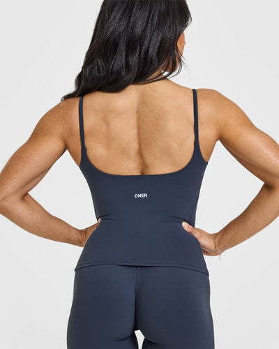 SoftMotion™ Strappy Vest with Built in Bra Shelf with White Logo | True Blue