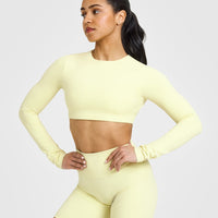 SoftMotion™ Long Sleeve Crop Top with White Logo | Pastel Yellow