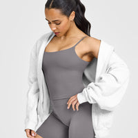 SoftMotion™ Strappy Mid Vest with Built in Bra Shelf with White Logo | Ash Grey