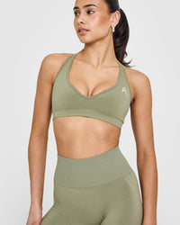 Effortless Seamless Racer Back Sports Bra with White Logo | Deep Sage Green