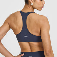 SoftMotion™ Sports Bra with White Logo | True Blue