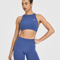 EasyLift™ High Neck Sports Bra with White Logo | Shadow Blue