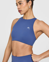 EasyLift™ High Neck Sports Bra with White Logo | Shadow Blue
