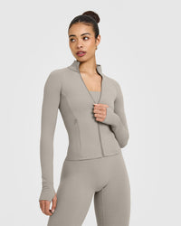 SoftMotion™ Jacket with White Logo | Warm Sand