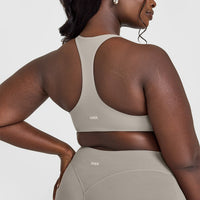 SoftMotion™ Bralette with White Logo | Warm Sand