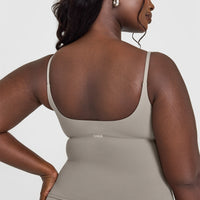 SoftMotion™ Strappy Vest with Built in Bra Shelf with White Logo | Warm Sand