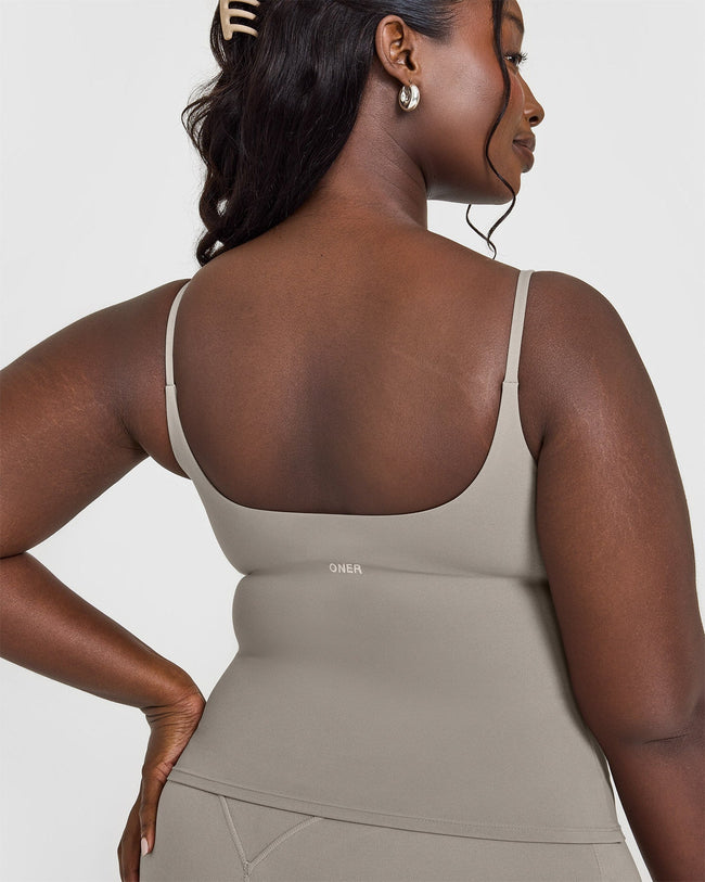 SoftMotion™ Strappy Vest with Built in Bra Shelf with White Logo | Warm Sand